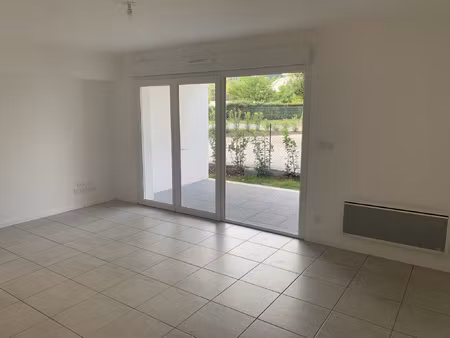 appartement t3 neuf avec terrasse  jardin et parking.