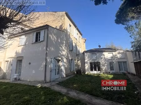 immeuble de rapport avec 7 appartements et 2 locaux commerciaux