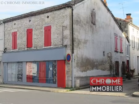 immeuble libre avec local commercial et appartement