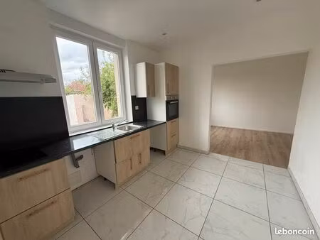 f3 de 58 m2 dans une maison bi-famille