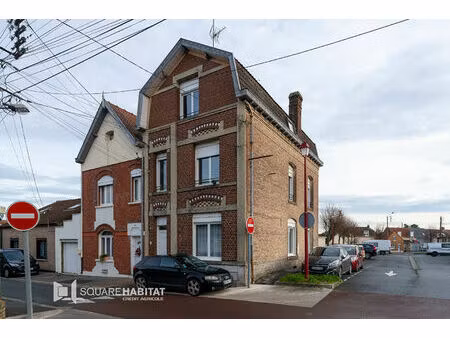 immeuble comprenant 2 logements et garage