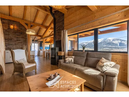 chalet en bois massif avec vue imprenable