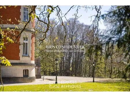 château début xxème siècle avec parc et dépendances
