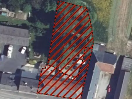 ensemble immobilier locatif + terrains à bâtir