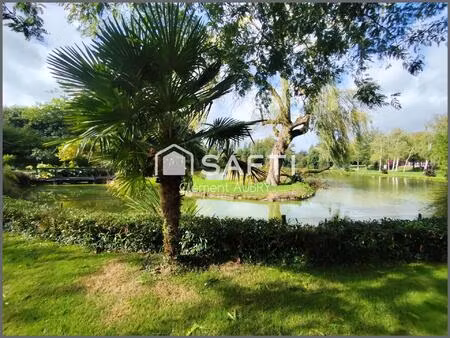 venez découvrir cette maison pleine de charme  nichée sur un terrain exceptionnel avec son