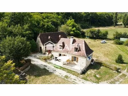 ancien moulin avec ruisseau sur la propriété