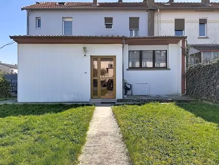 maison jumelée avec jardin et garages