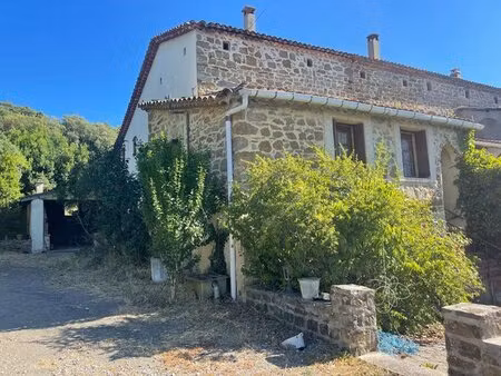 mas en pierres mitoyen proche anduze sur terrain constructible de 1900 m2