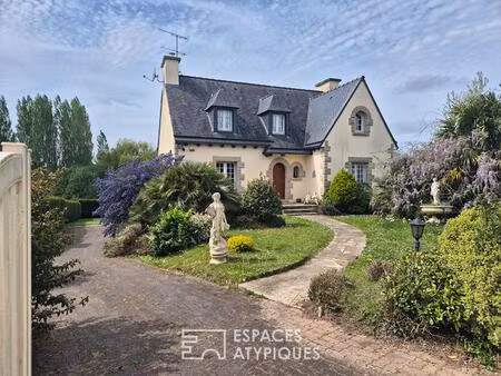 grande propriété avec véranda lumineuse et grand jardin