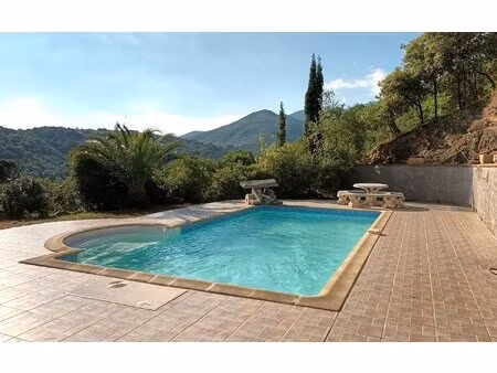 maison indépendante de plain-pied  calme  nature  vue dégagée  piscine  garage