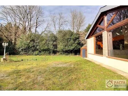 arfons - maison esprit chalet sur 1730 m² de terrain.