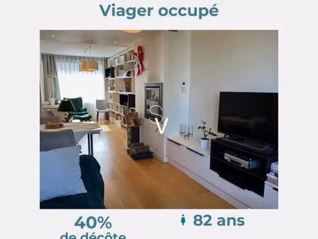 viager occupé - appartement t3 de 72 m2 avec terrasse et garage fermé - madame 82 ans