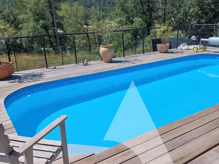 maison de 100m² avec piscine de 7x3m  petit garage terrain de 700m²