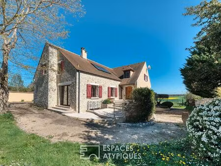 maison familiale au coeur de la nature avec terrain paysager