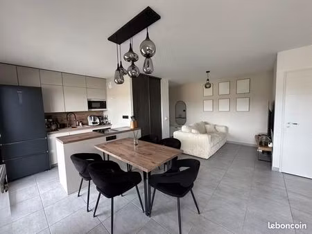 t2 neuf 47m² + balcon 10m² + double garage – dpe b – résidence 2025