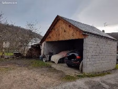 vente d un garage + terrains