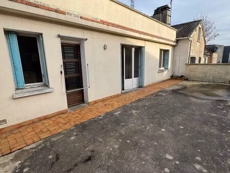 ensemble de 3 logements avec garages