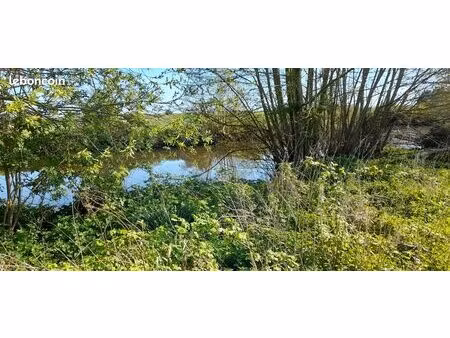 a vendre terrain bord de l'ozanne