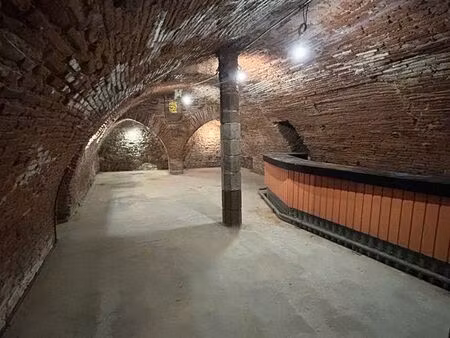 cave voutée 100m² centre historique