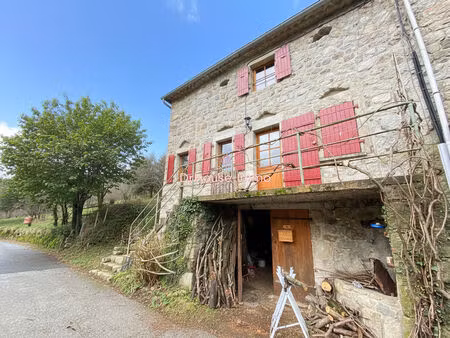 exclusivité pereyres  maison de village mitoyenne en pierres d'environ 68 m²  dépendance d