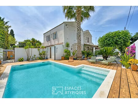 maison de caractère en pierres avec piscine et jardin