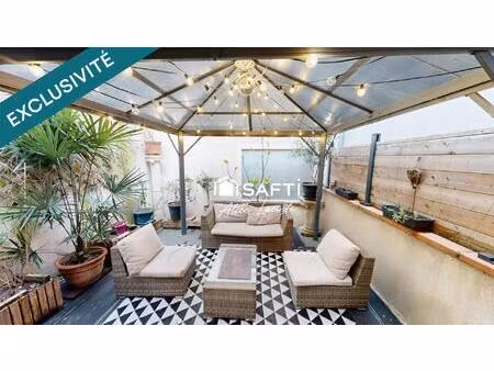 85 m² de pièce de vie et deux terrasses en cœur de village