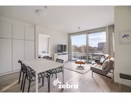 moderne serviceflat met prachtig zicht op de leie en autostaanplaats te deinze!