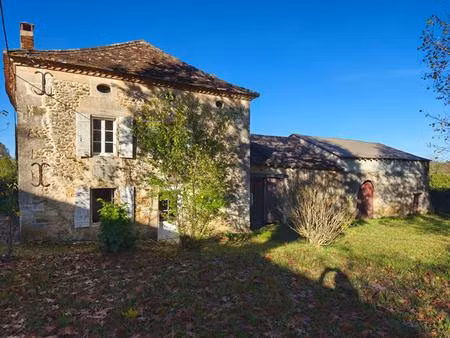 a la campagne  au calme  bel ensemble en pierre à rénover  cachet  gros potentiel