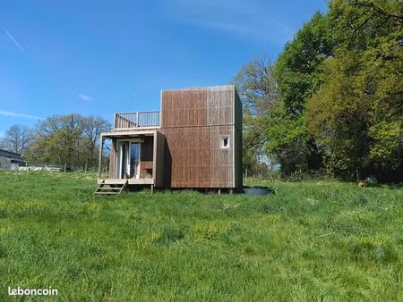vente terrain constructible (2172m²) et petite maison en bois 28m²