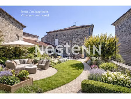 a vendre superbe maison de village en pierres  4 chambres  avec jardin et grand garage