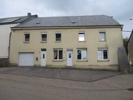 appartement au rez-de-chaussée d’environ 101 m2