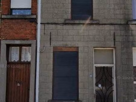 une habitation de 96 ca à rénover et un terrain de 65 ca