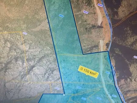 terrain avec bâtisse