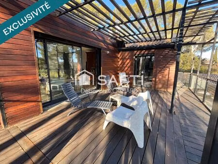 superbe villa d'architecte de 256m2 hab nichée dans un cadre verdoyant proche commerces