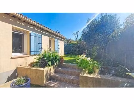 maison de plain pied-garage-jardin- bras