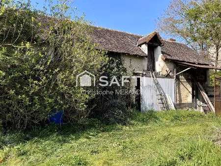anciene ferme dans le centre sur plus de 3000 m2