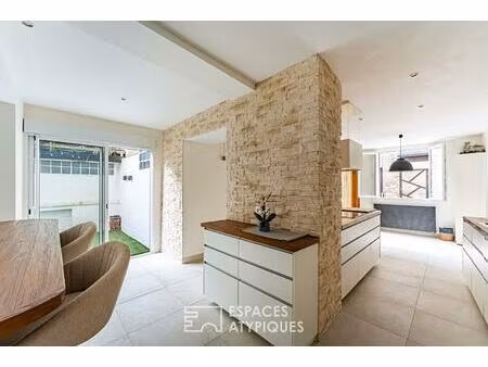 très belle rénovation d'une maison ancienne dans le coeur historique de carrières sur sein