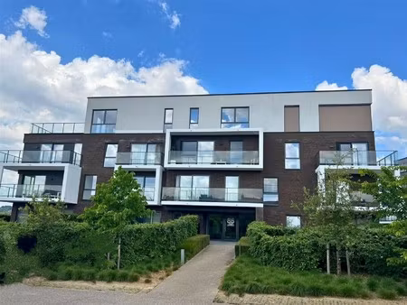 comfortabel wonen met zicht op groen : 2 slaapkamers  terras en garage inbegrepen