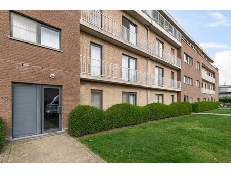 gelijkvloers appartement met tuin en staanplaats