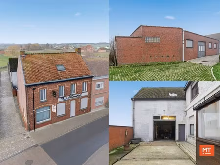 bijzonder ruim gebouw met magazijn in de dorpskern van zandvoorde (zonnebeke)