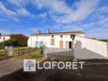 ensemble immobilier composé de deux maisons  dépendances et terrain clos de 2500 m² enviro