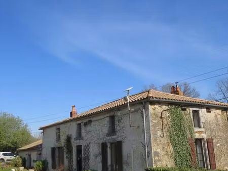 ancien moulin dans son cadre bucolique