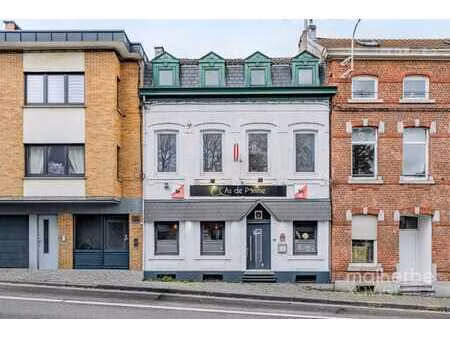 immeuble mixte avec surface commerciale et apprt libre