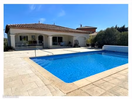 maison à vendre avec grande piscine chauffée