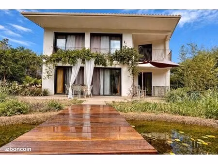 ? villa bioclimatique d’exception avec piscine naturelle – là où le confort rencontre la n