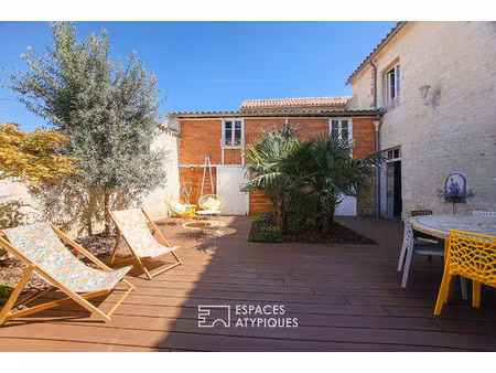 maison bourgeoise avec patio et garage en centre ville