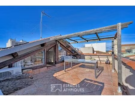 l'ancienne poste de palavas métamorphosée en maison de ville avec toit terrasse vue mer