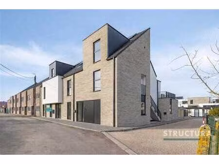 appartement duplex neuf avec garage! (vente soumise à la tva