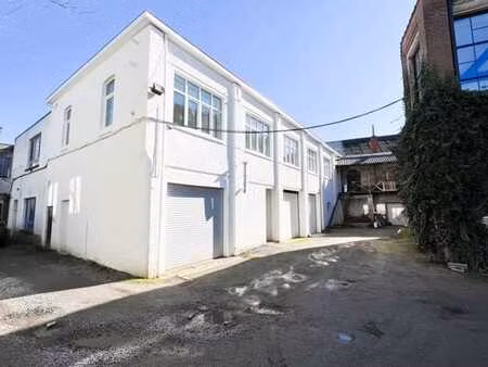 lot de 2 appartements + 2 ateliers + 1 box garage