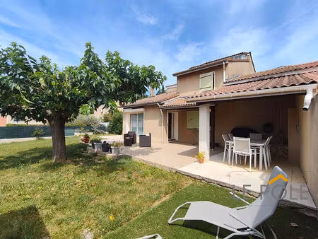 maison avec jardin et garage / quartier residentiel calme